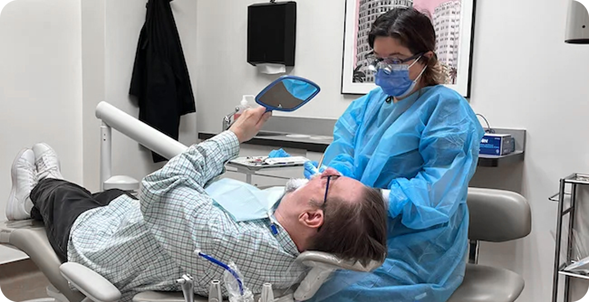 Dental practitioner performing checkups and cleanings process