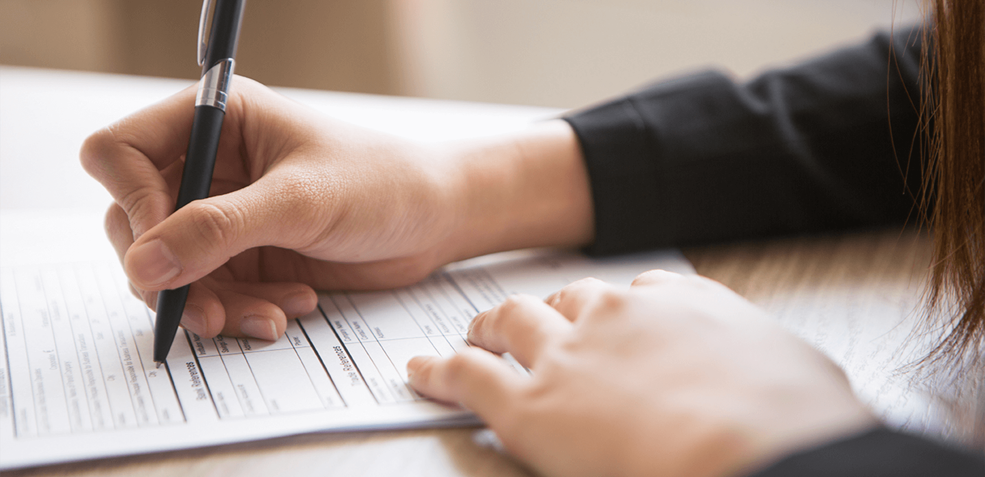 Woman filling out patient forms