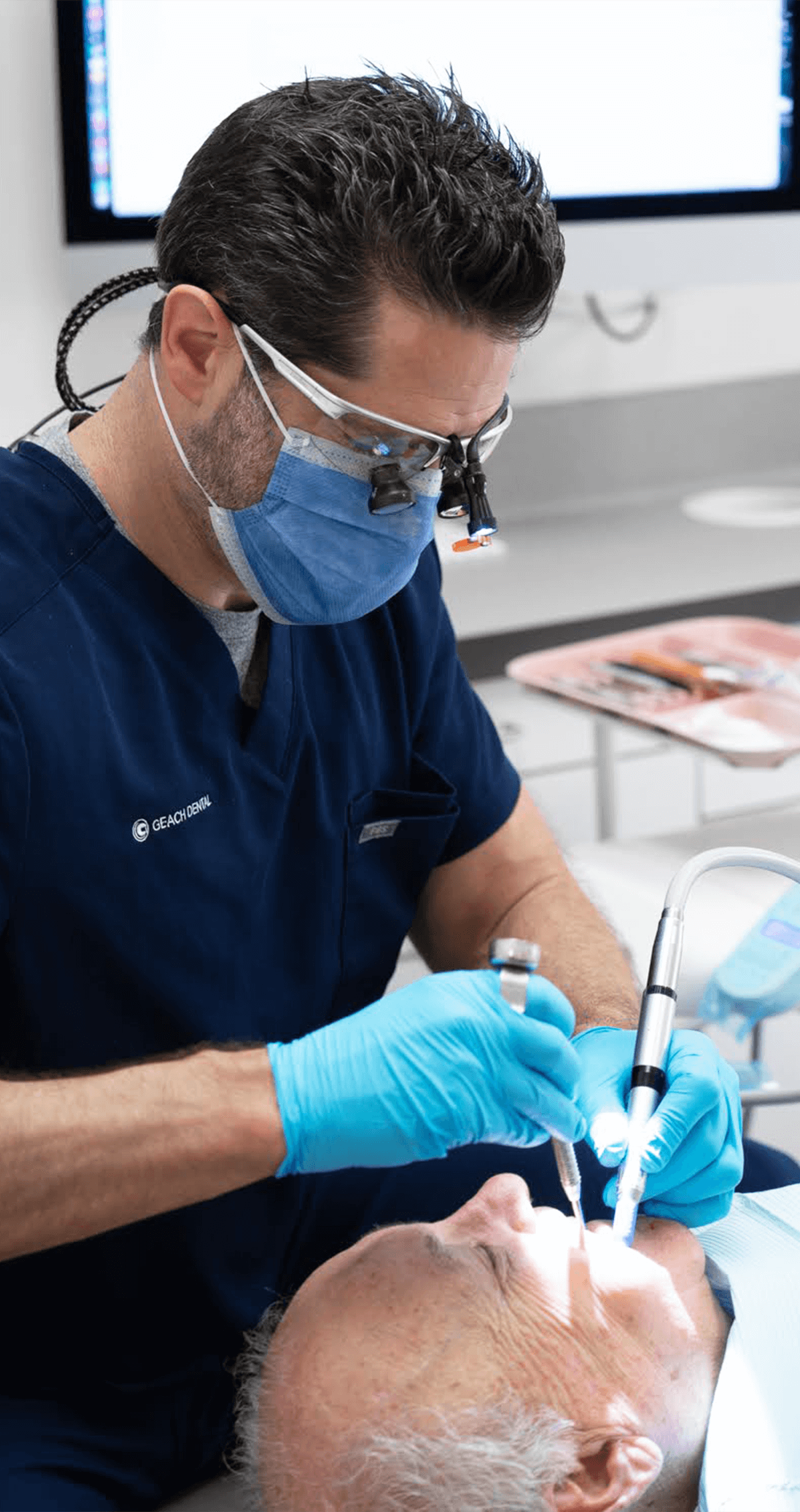 Dr. Geach treating a patient